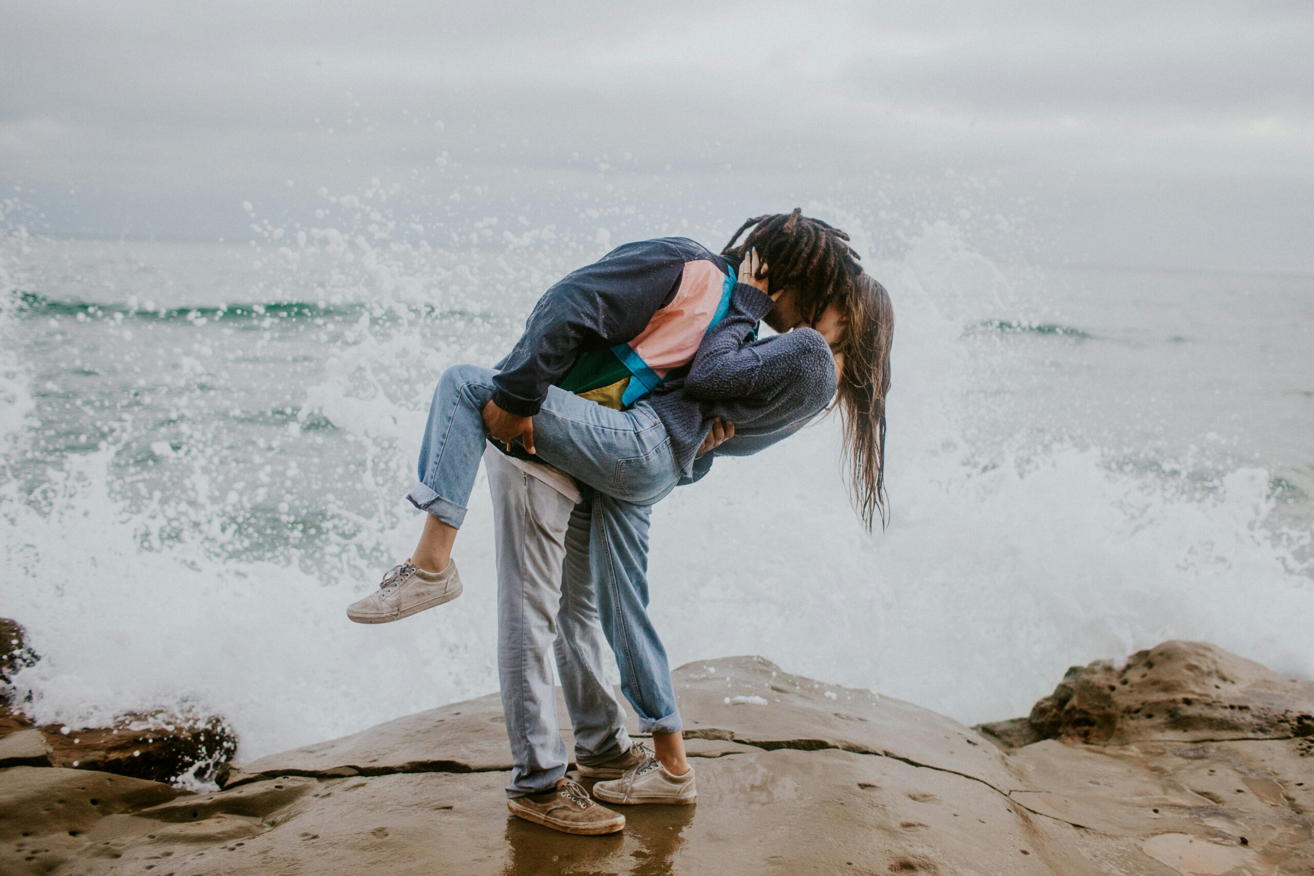 romantic couple embracing on the beach